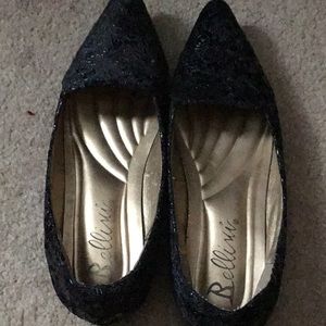 This is a black flowered heel